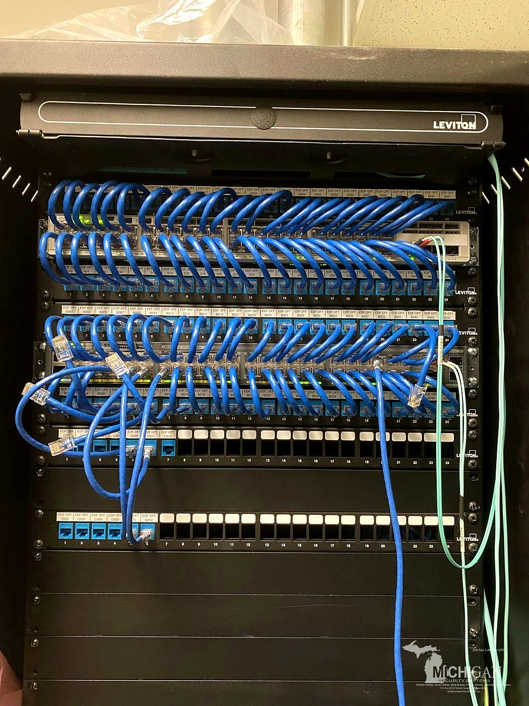 Network & Structured Cabling Installation | Michigan Security Systems Network rack, Altronix power supply and Cat6 structured cabling installation — Michigan Security Systems