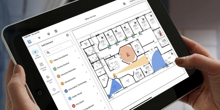 Commercial security system design and site survey on a tablet — Michigan Security Systems custom-designs every Digital Watchdog system before installation