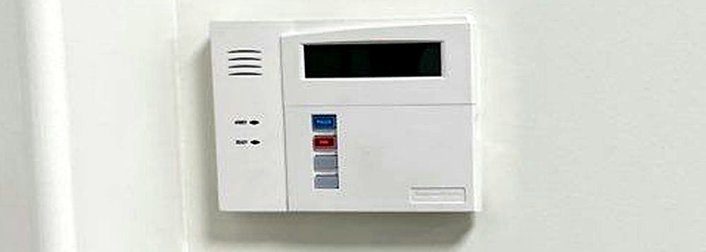 Commercial Alarm Systems Installation | Michigan Security Systems Resideo commercial alarm panel and Alarm.com installation — Michigan Security Systems commercial alarm systems